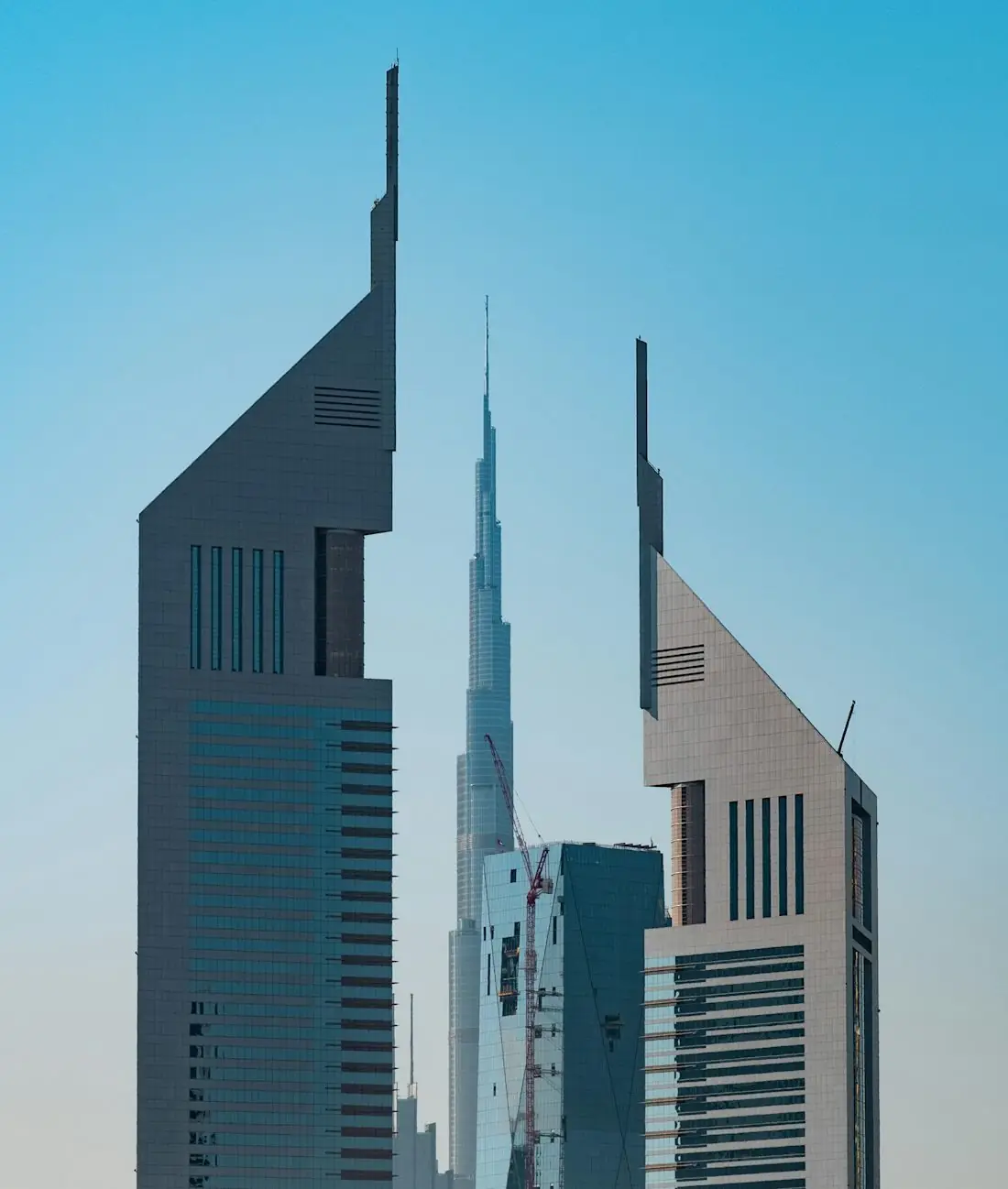 Emirates Towers against a clear Dubai sky