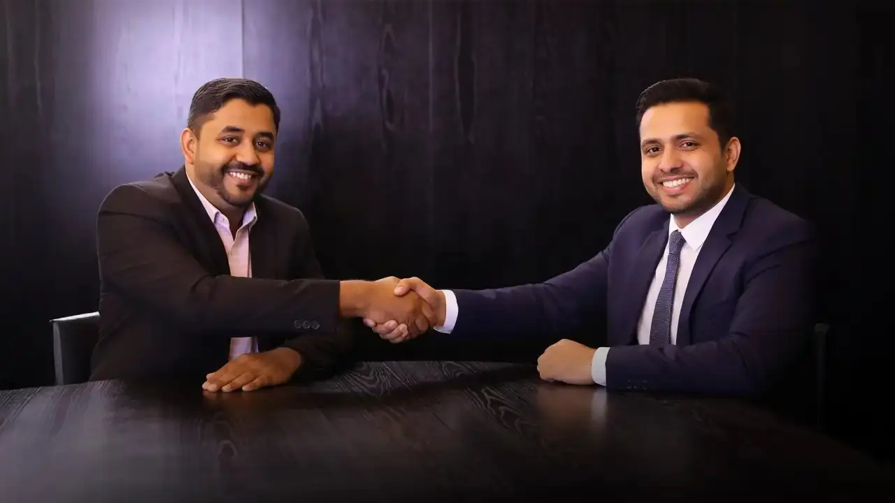 An Emiracle advisor welcoming a client